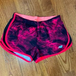 New Balance neon coral and black tie dye shorts